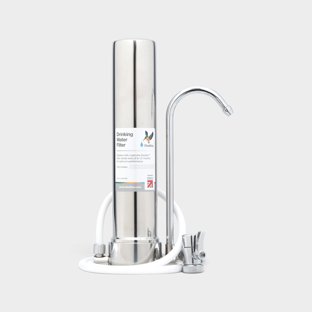 Doulton chrome countertop water filter with its tap diverter and tubing